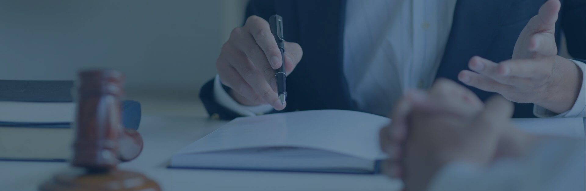 Lawyer reviewing documents with a client